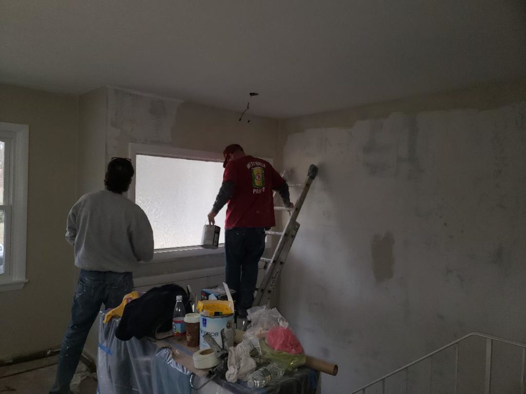 skiming wall then sanding, getting ready to prime